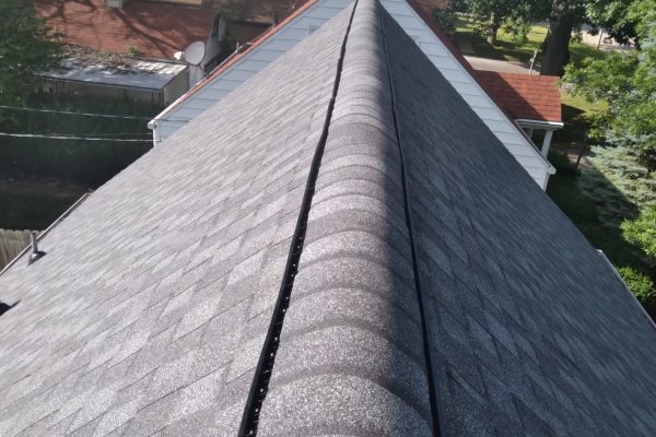 pantheon-roofing-solutions-roof-replacement-1 Photo of a sloped roof replacement by Pantheon Roofing Solutions