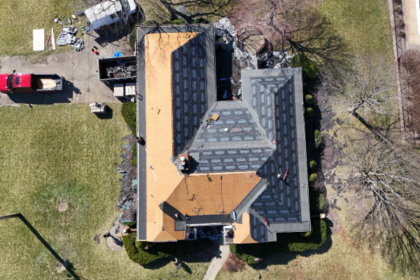 3 Aerial view of a Champaign IL homeowner's roof replacement in progress.