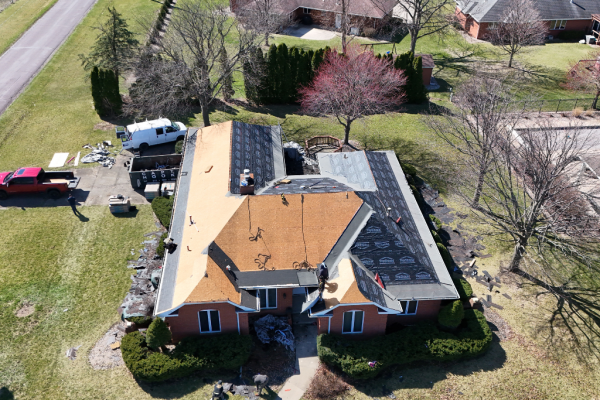 5 Aerial photo of a roof replacement mid-process in Champaign, IL