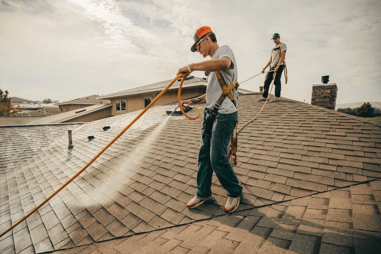 Roof Maxx rejuvenation treatment being applied in Champaign, IL