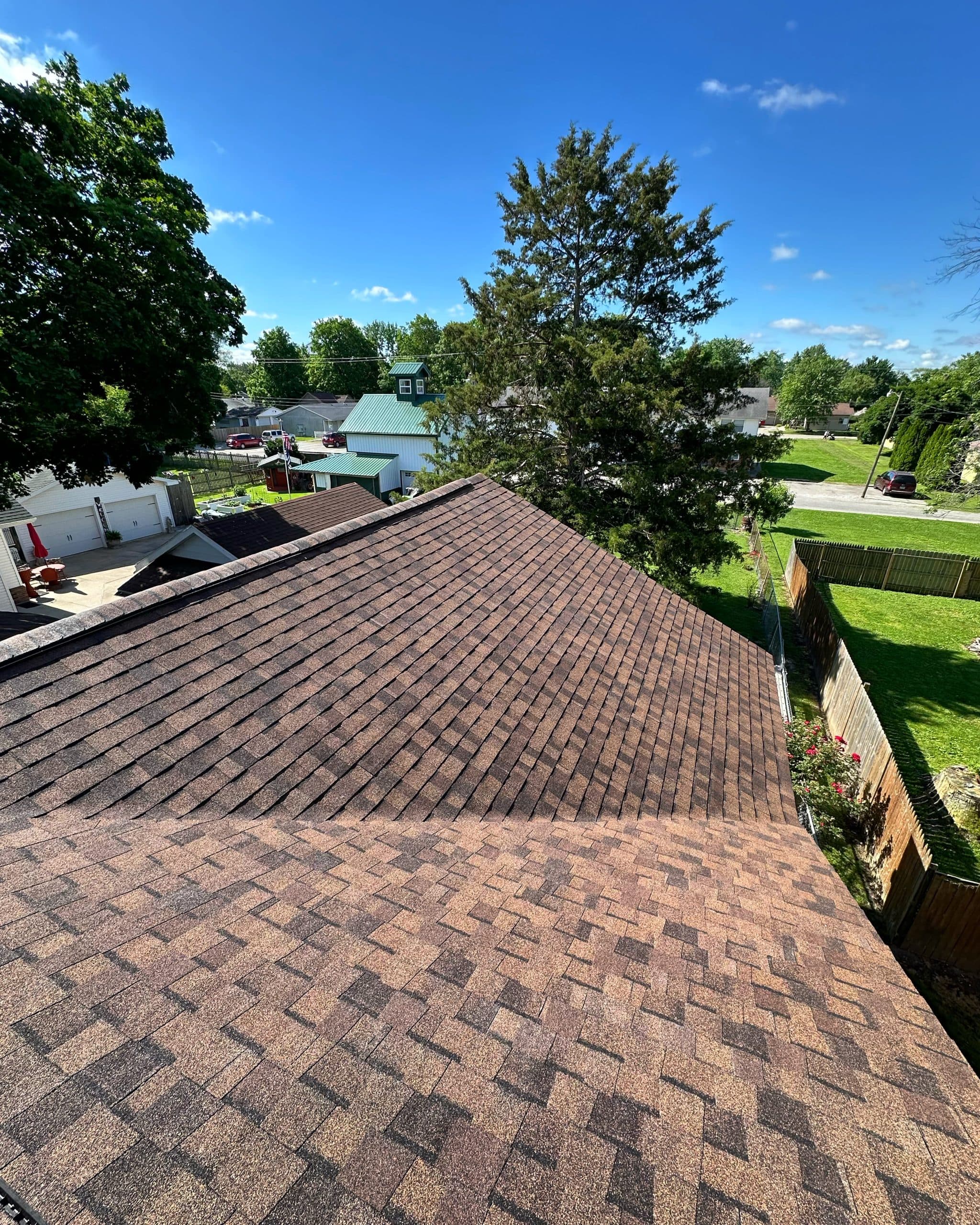 Pantheon Roofing Solutions licensed crew installing a roof replacement in Champaign-Urbana, credentials in practice