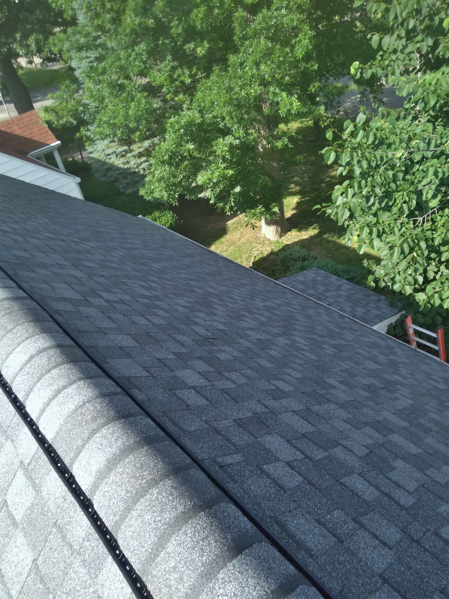 Ridge cap and vent: Pantheon Roofing Solutions work in the Champaign, IL area