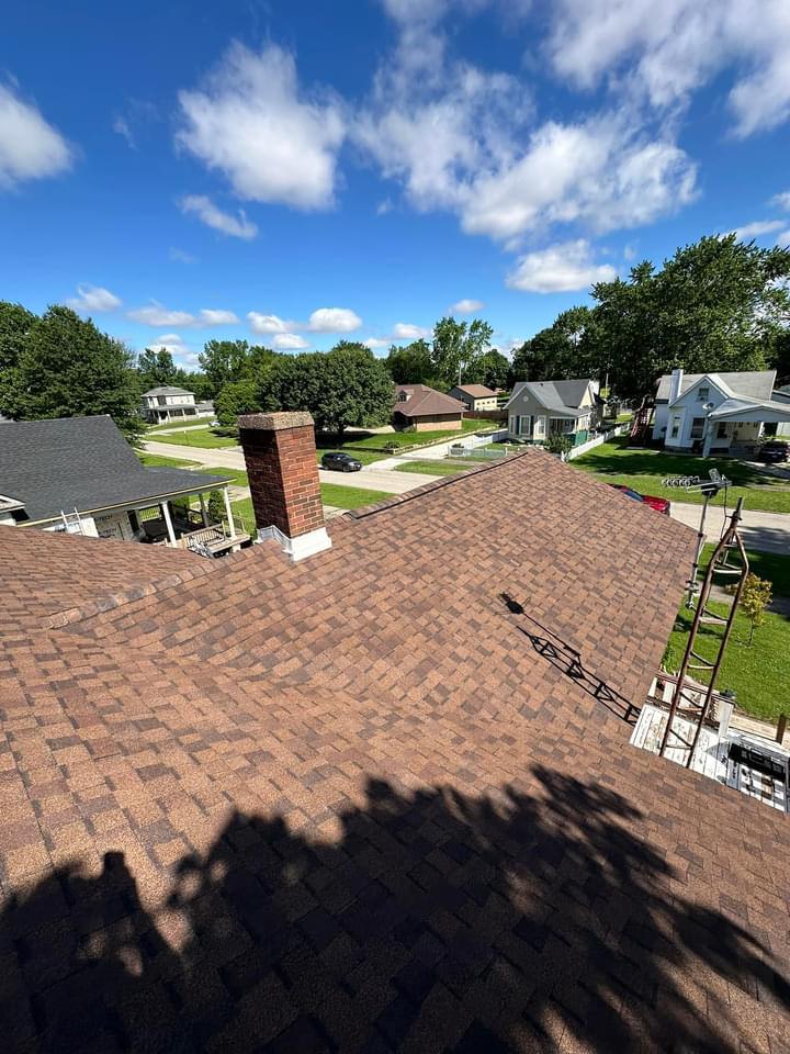 Worn shingles before the tear-off: Pantheon Roofing Solutions work in the Champaign, IL area