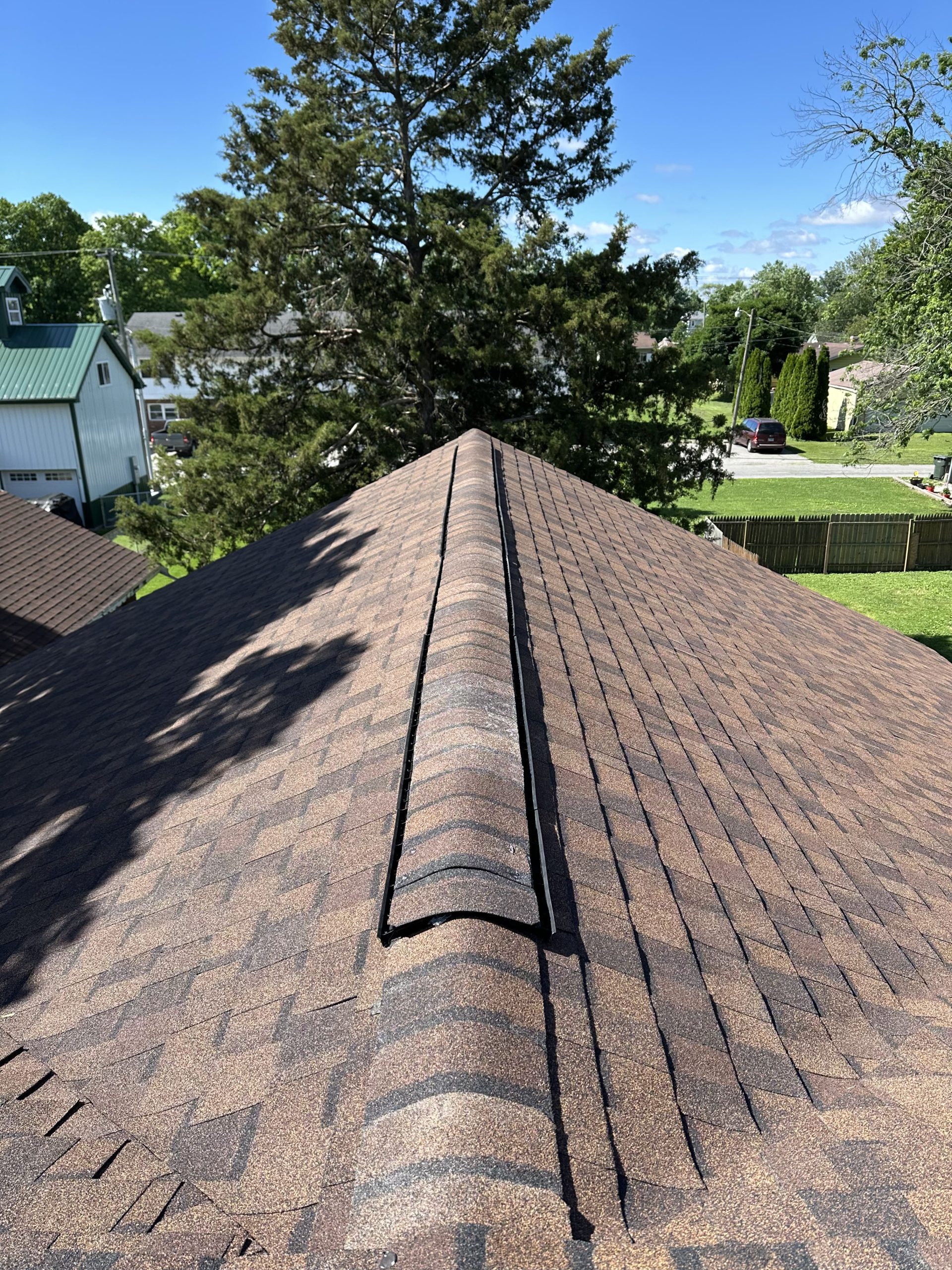 A straight new ridge line: Pantheon Roofing Solutions work in the Champaign, IL area