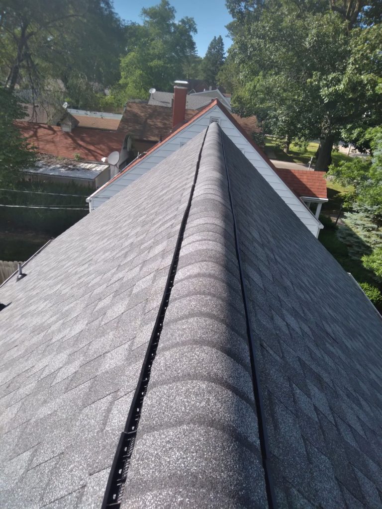 Photo of a sloped roof replacement by Pantheon Roofing Solutions